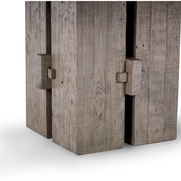 Rustic wooden structure with geometric design.