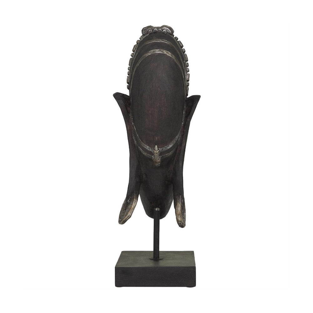 Dark wooden African mask on display stand.