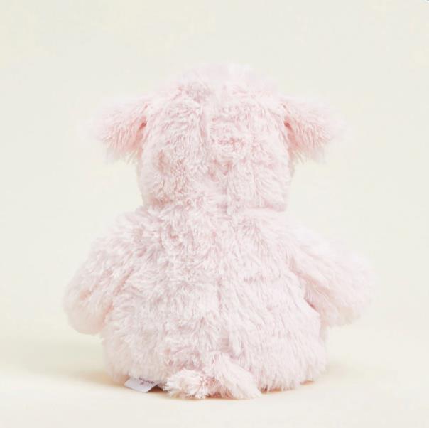 Fluffy pale pink plush toy viewed from the back.