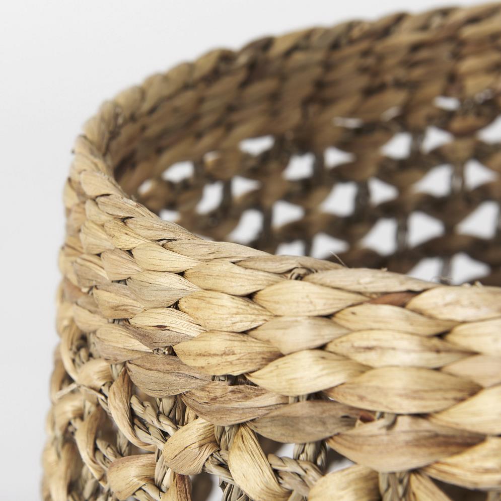 Close-up of woven wicker basket with intricate pattern.