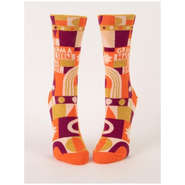 Colorful patterned socks with playful text design.