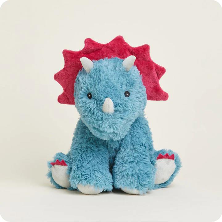 Plush blue triceratops toy with a red frill, sitting against a light background.