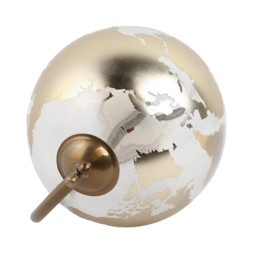 Golden globe sculpture with continents in white.