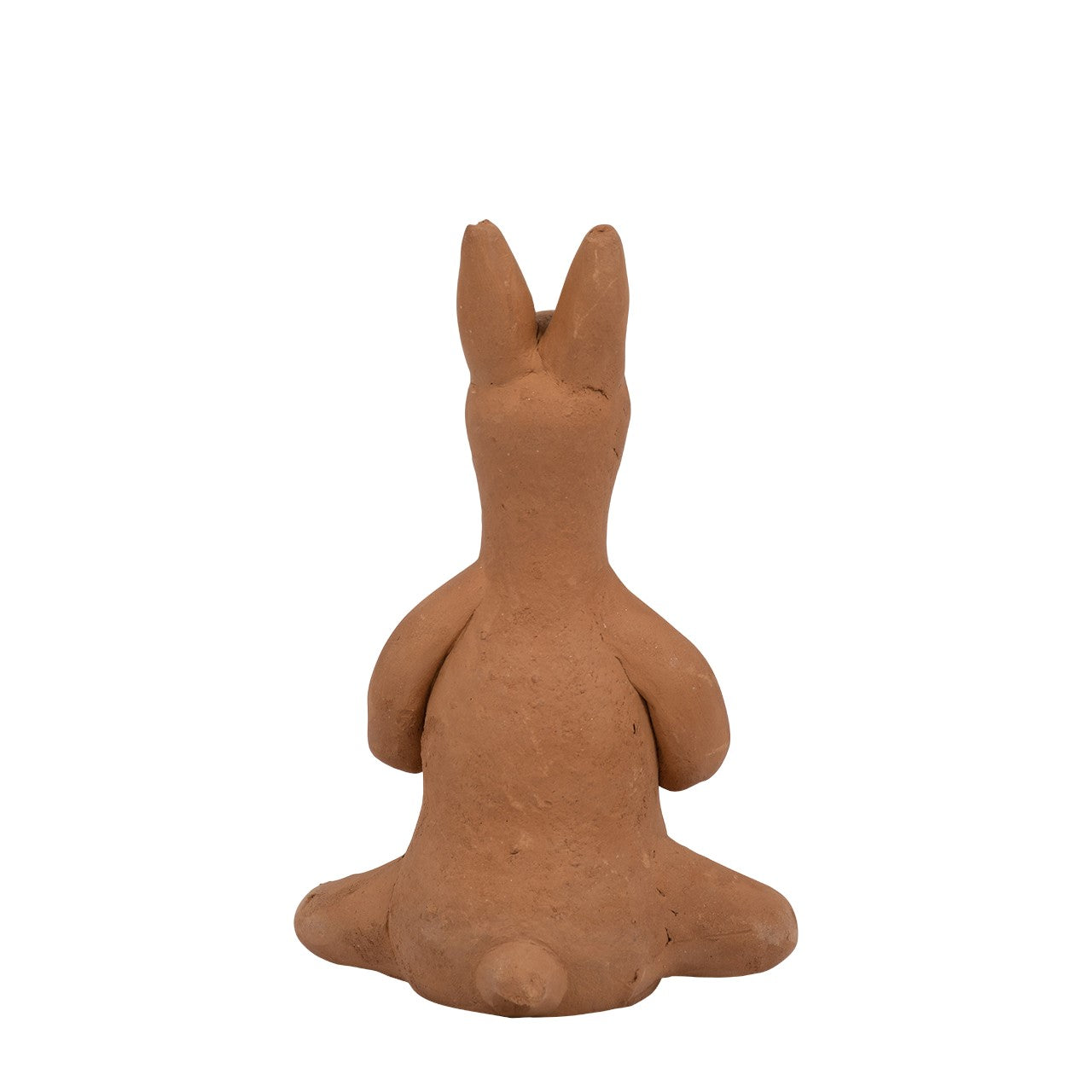 Clay rabbit sculpture facing away.
