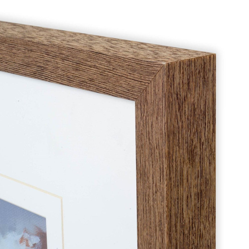 Close-up of a wooden picture frame corner.