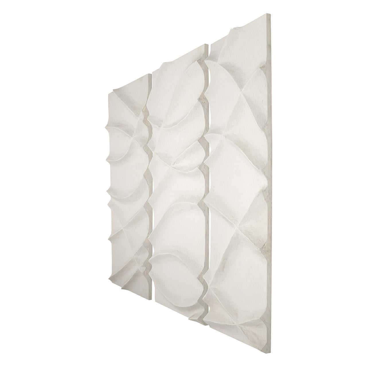 White textured 3D wall panel with geometric patterns.