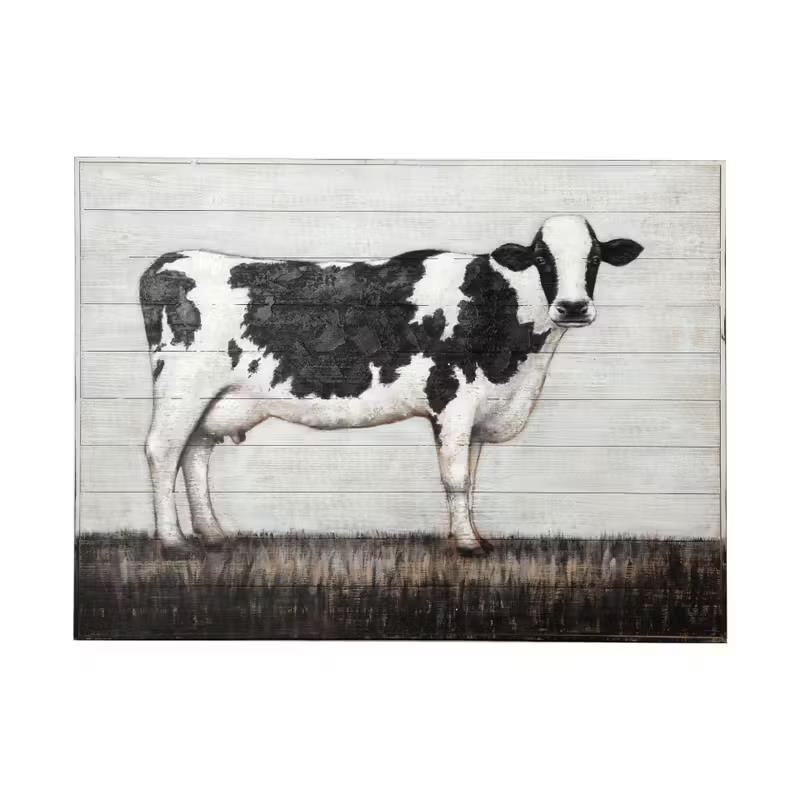 Cow painting on wood, white and black, rustic background.