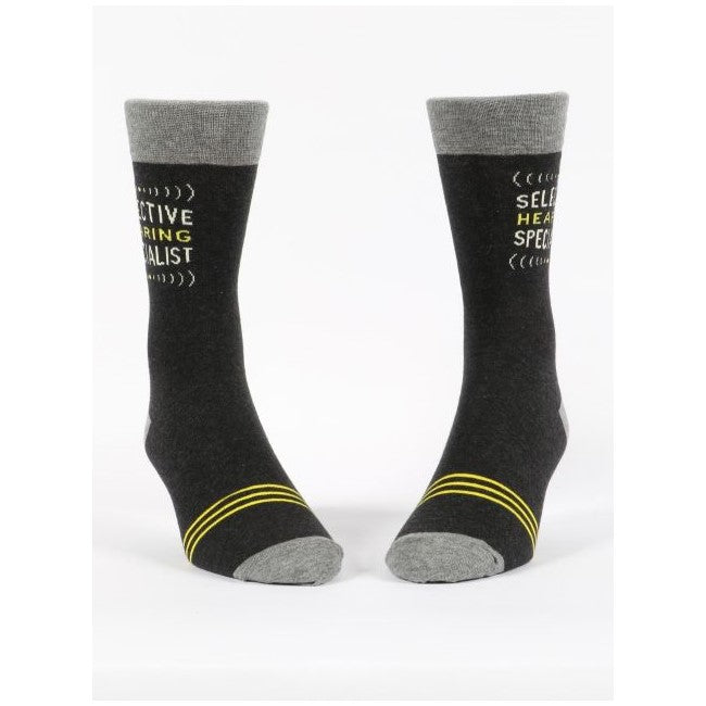 Gray socks with text: "SELECTIVE HEARING SPECIALIST," yellow stripes.