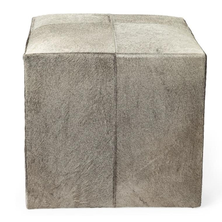 Gray textured cube-shaped pouf with a soft, fur-like surface.