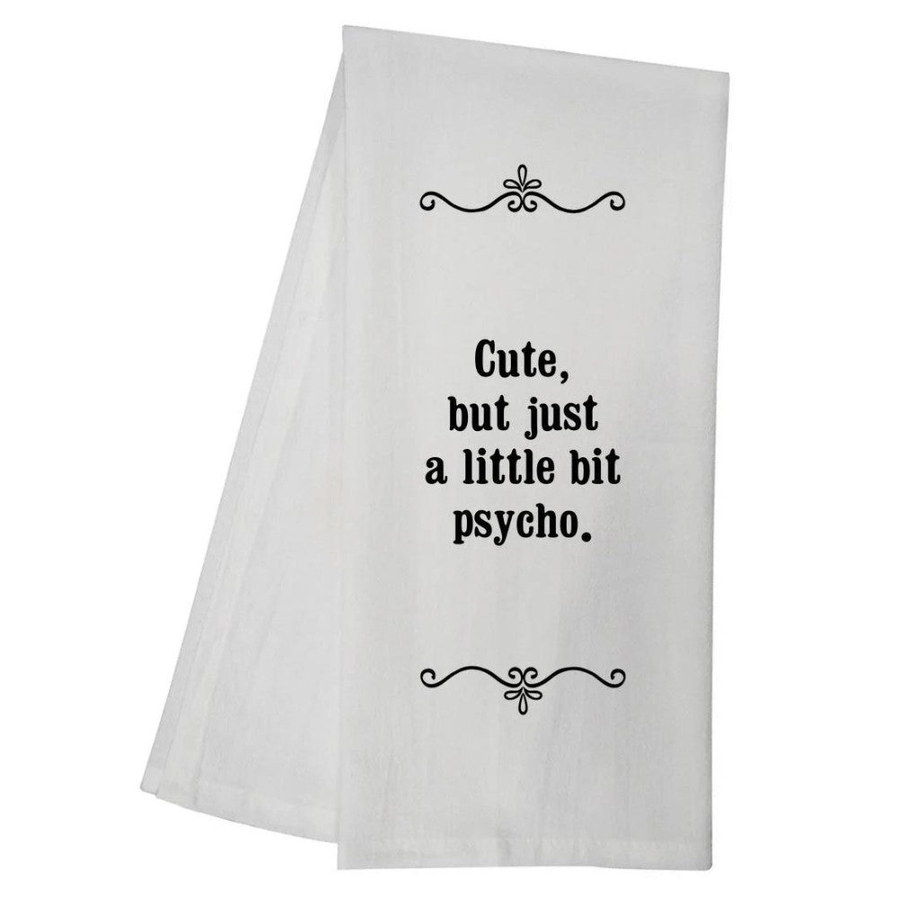 A white towel with a humorous quote in black text.