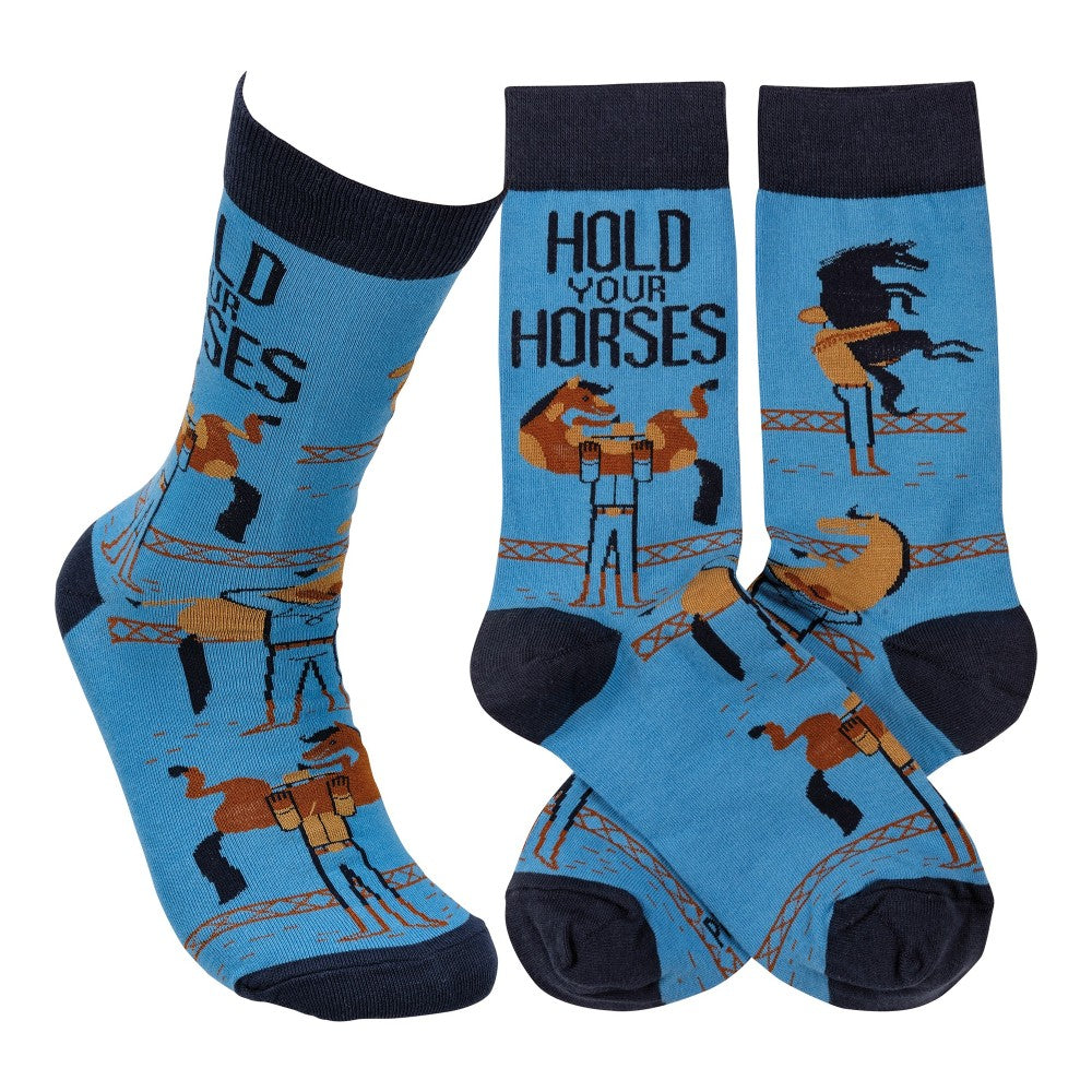 Blue socks with "Hold Your Horses" and cartoon horse designs.