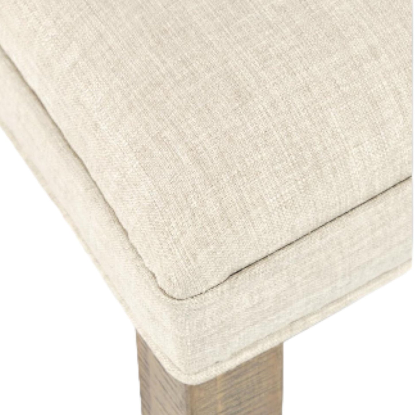 Beige cushioned seat corner with wooden leg.