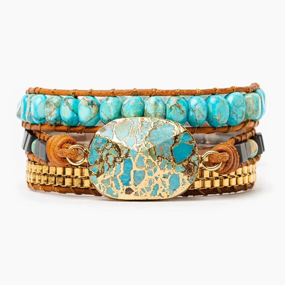 Layered bracelet with turquoise stones and gold accents.