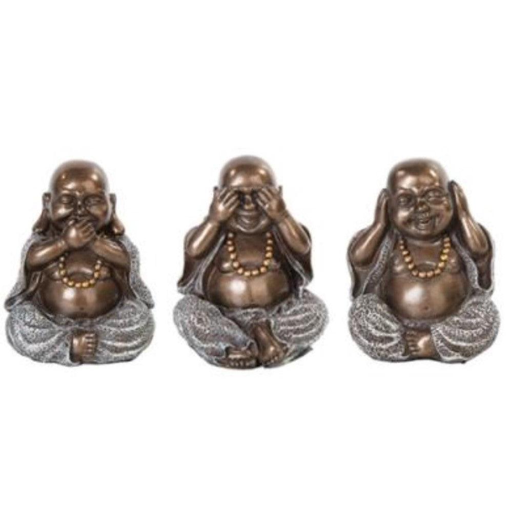 Three bronze Buddha statues: see no evil, hear no evil, speak no evil.