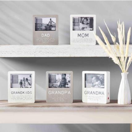 Framed family photos labeled Dad, Mom, Grandma, Grandpa, and Grandkids on shelves.
