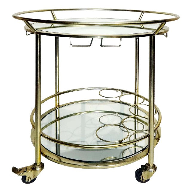 Gold metal and glass bar cart with wheels.