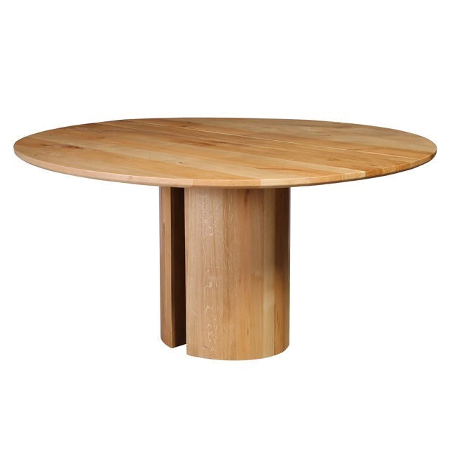 Round wooden table with a thick central pedestal.