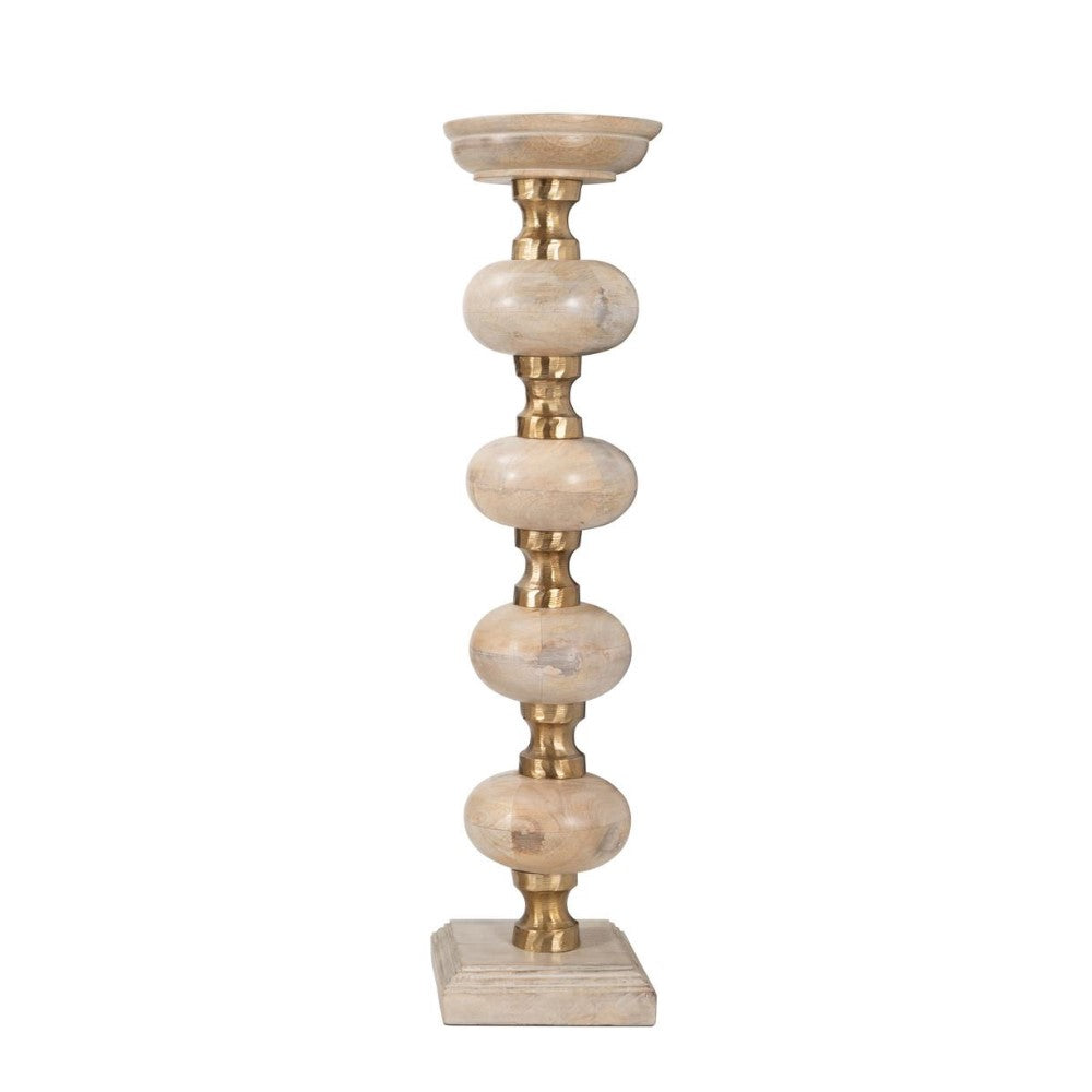 Tall, ornate candle holder with gold and stone accents.