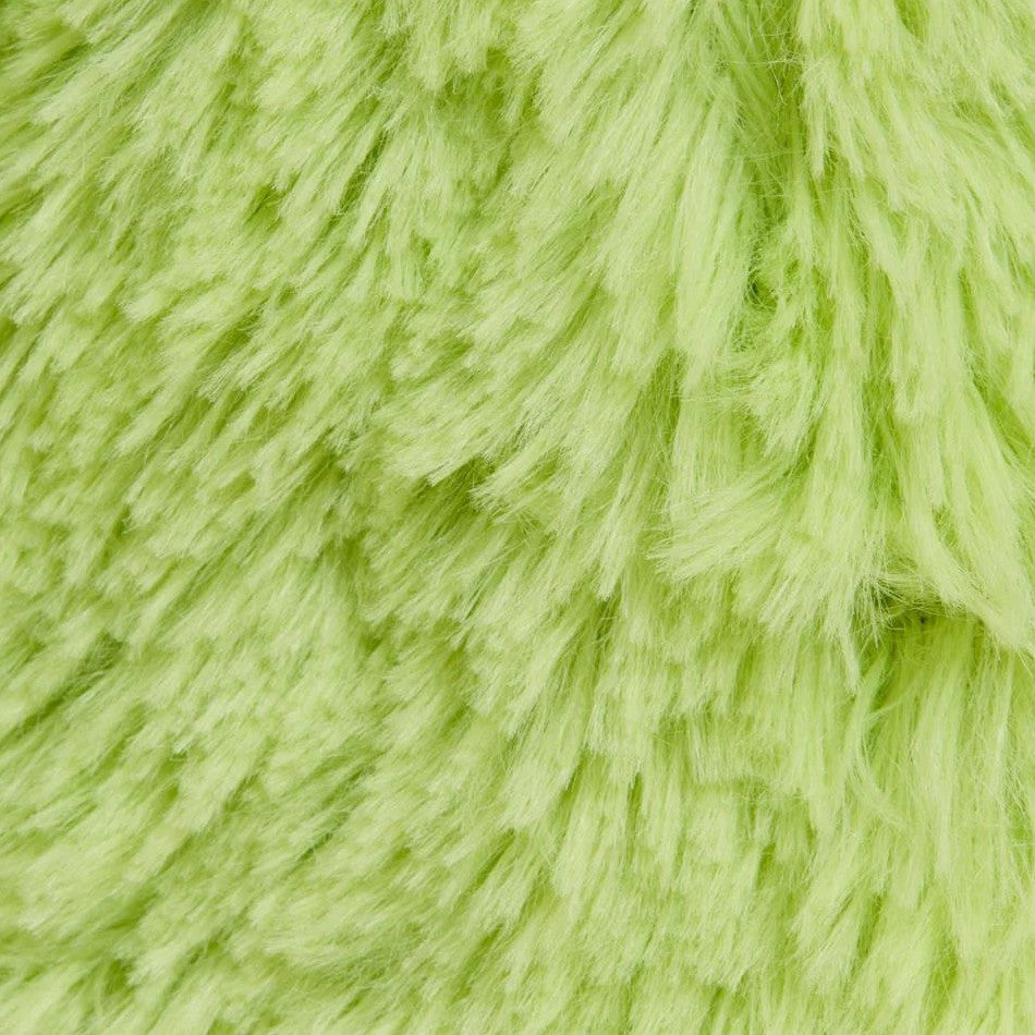 Fluffy lime green textured surface close-up.