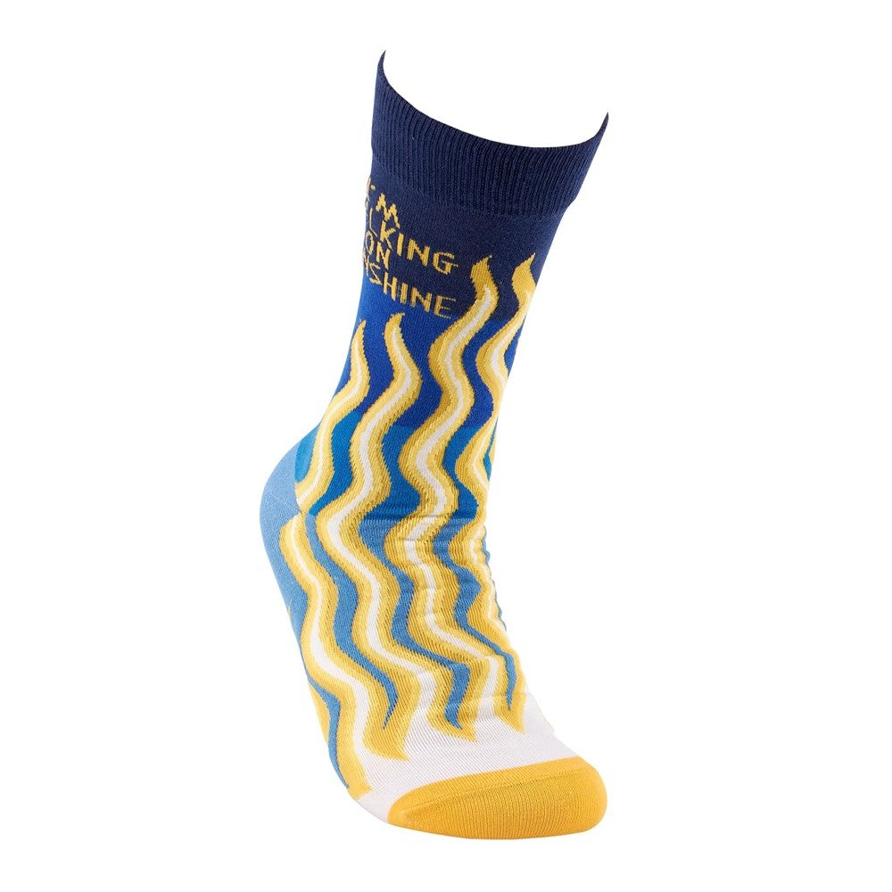Blue sock with yellow wavy stripes and text design.
