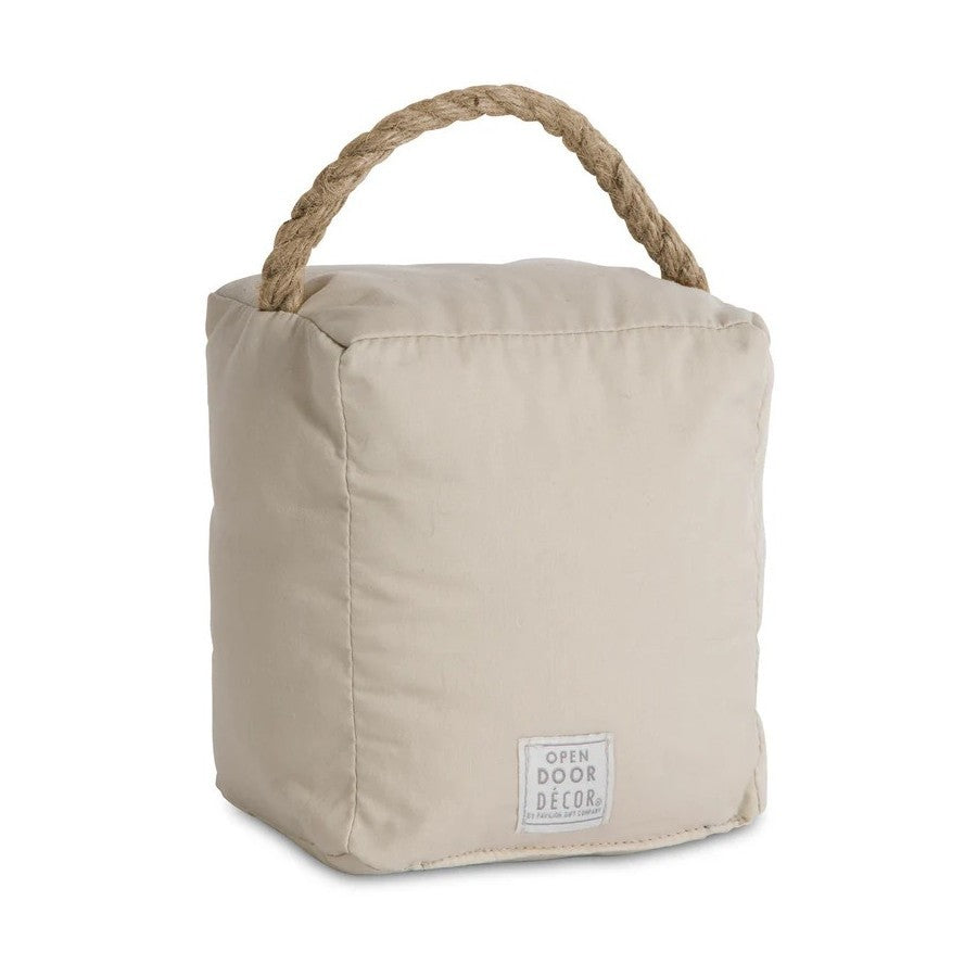 Beige fabric doorstop with rope handle.