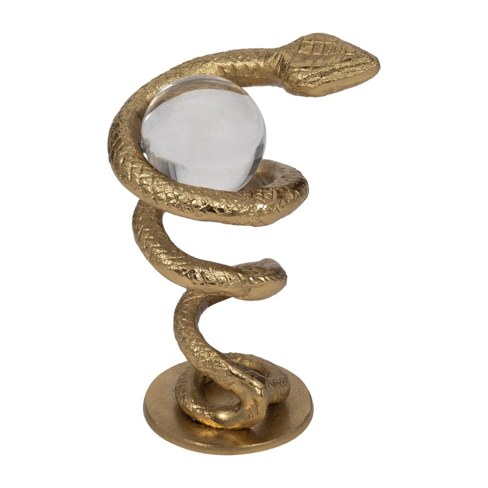 Golden snake sculpture coiled around a glass sphere.