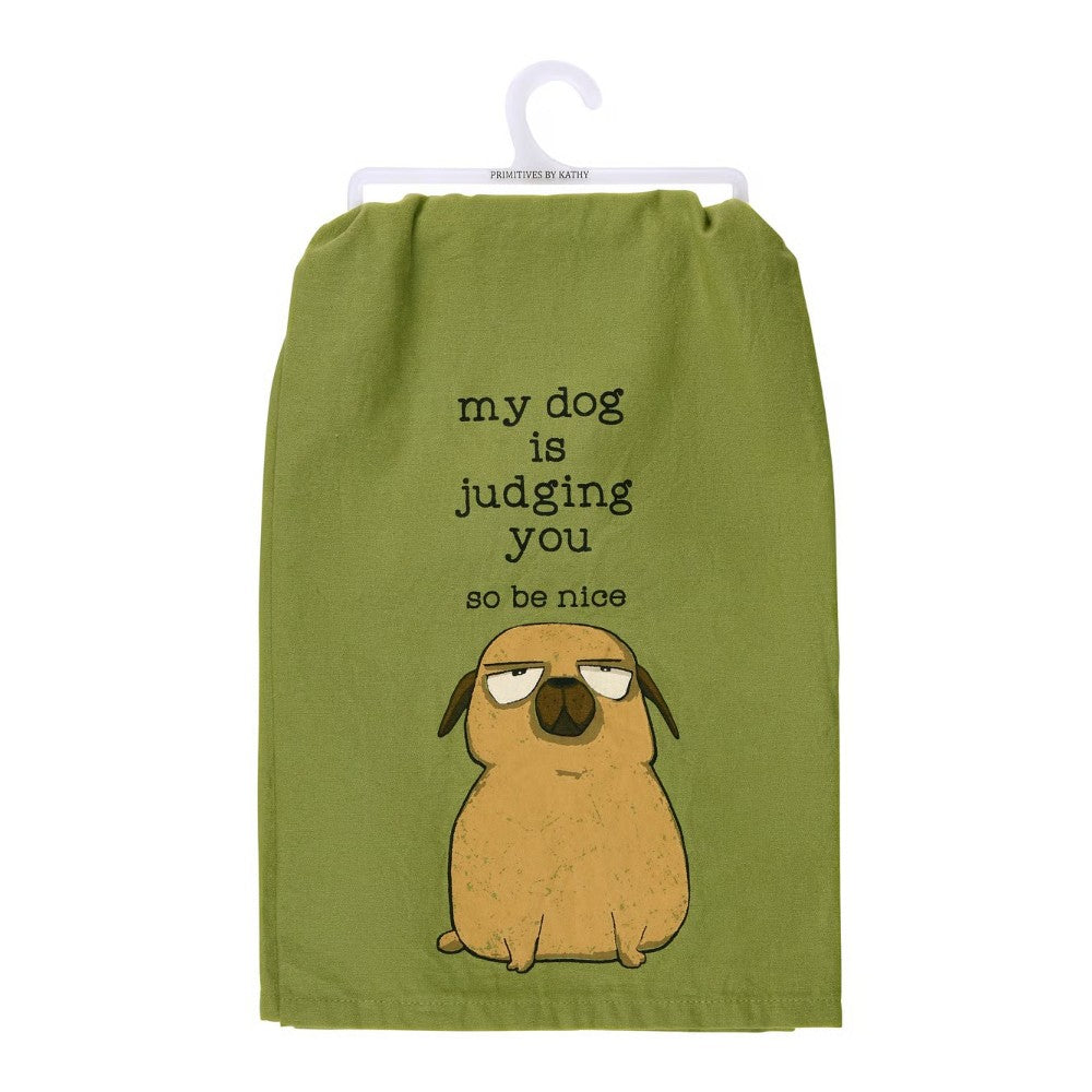 Green towel with a cartoon dog and text: "my dog is judging you, so be nice."