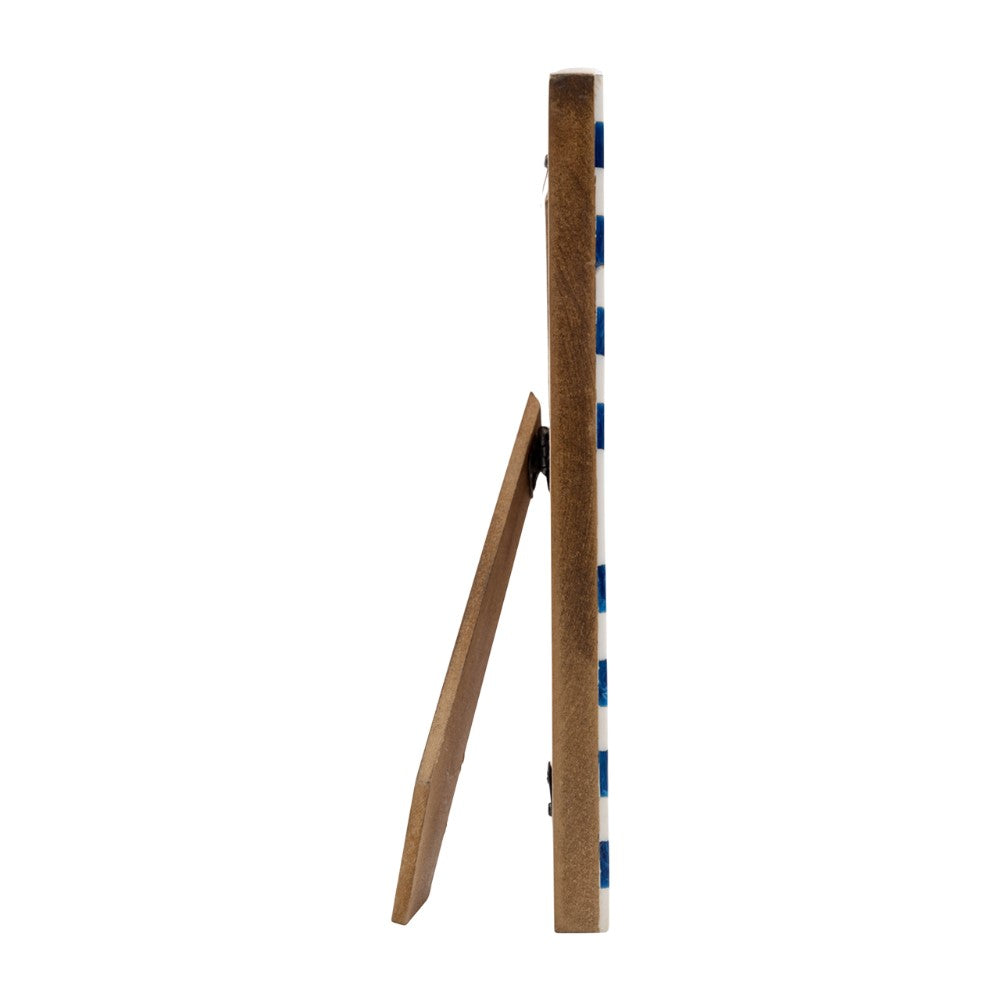 Wooden picture frame standing on a white background.