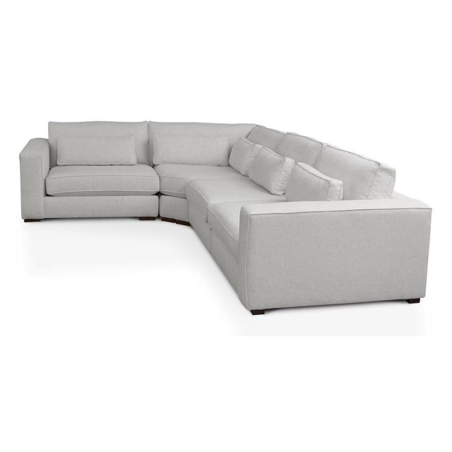 Modern light gray sectional sofa with clean lines.