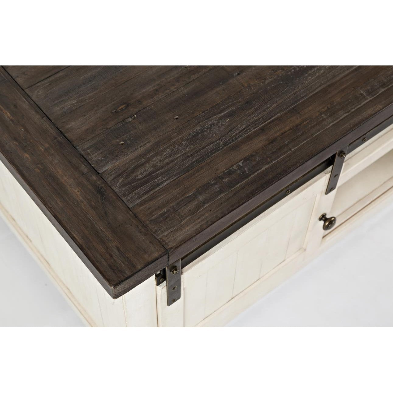 Wooden cabinet with dark top and sliding door.
