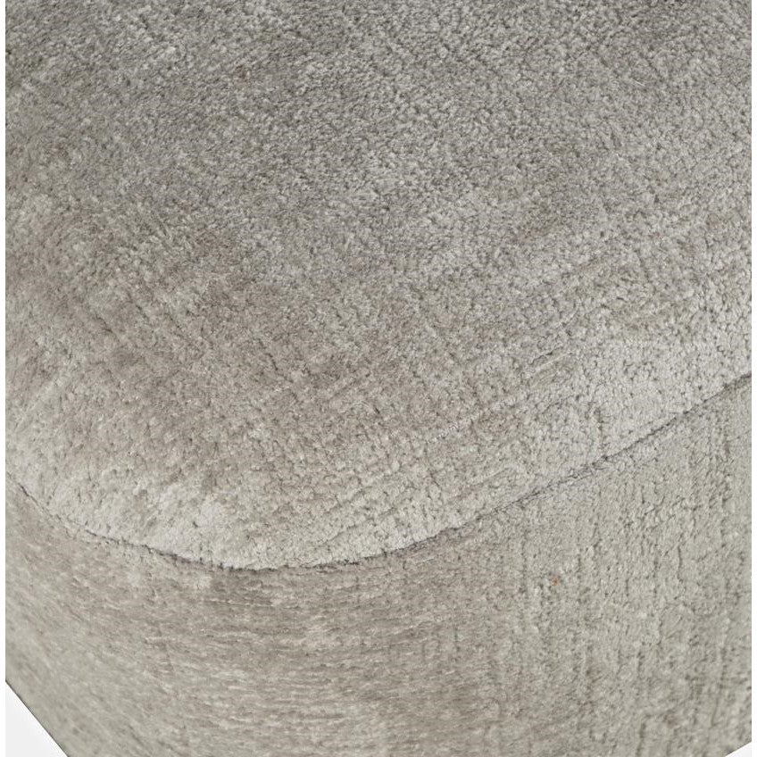 Close-up of gray textured fabric on a curved surface.