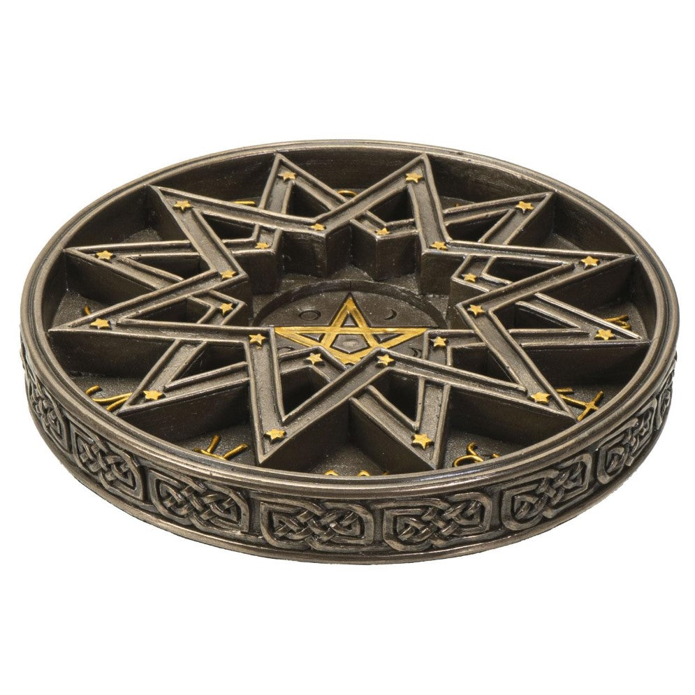 Round trinket dish with star motifs and intricate Celtic designs.