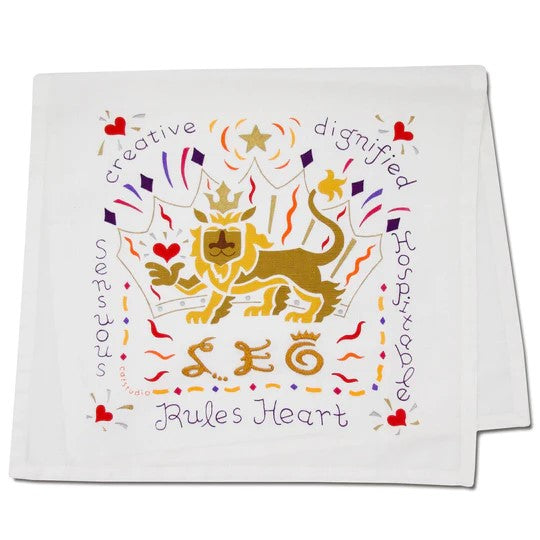 Stylized lion with words, zodiac Leo theme, vibrant colors on fabric.