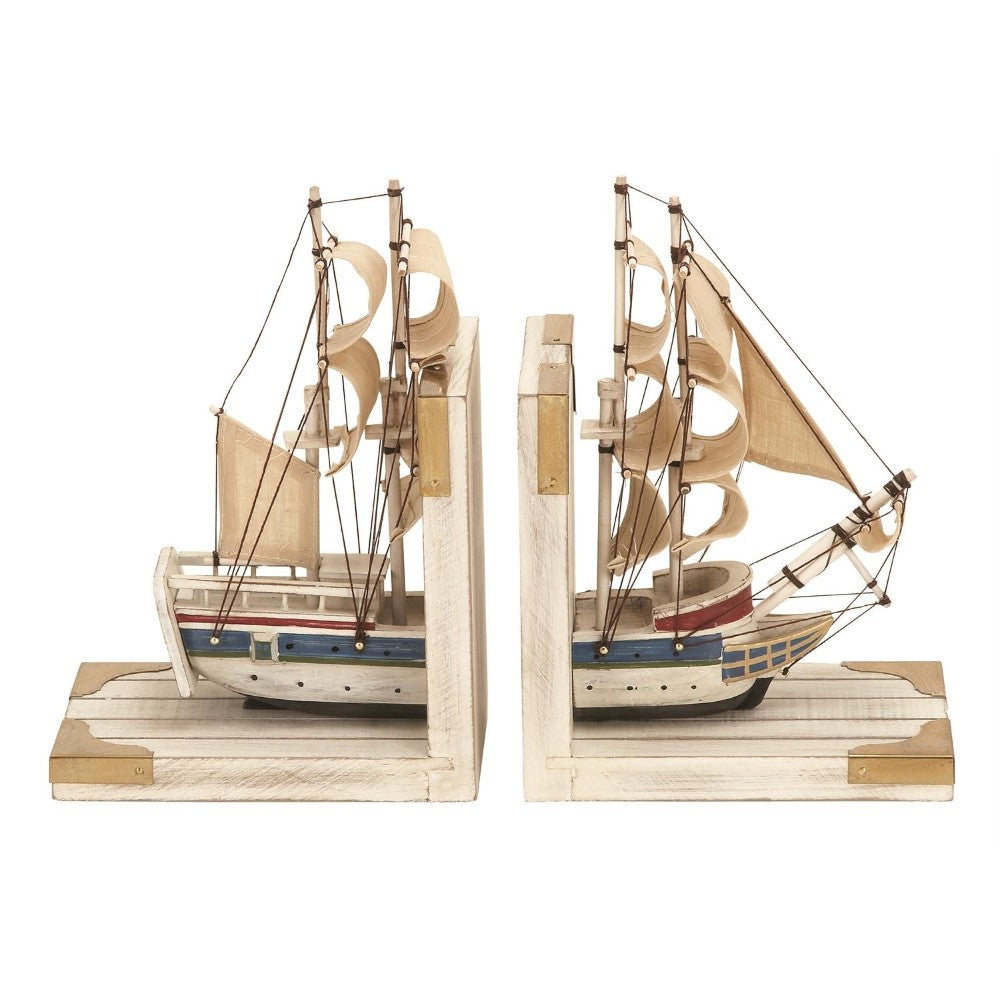 Two ship-shaped bookends facing each other, crafted intricately with sails.