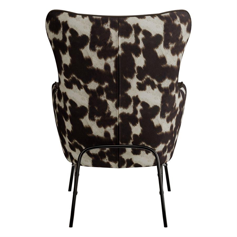 Cow print chair with black metal legs, viewed from the back.