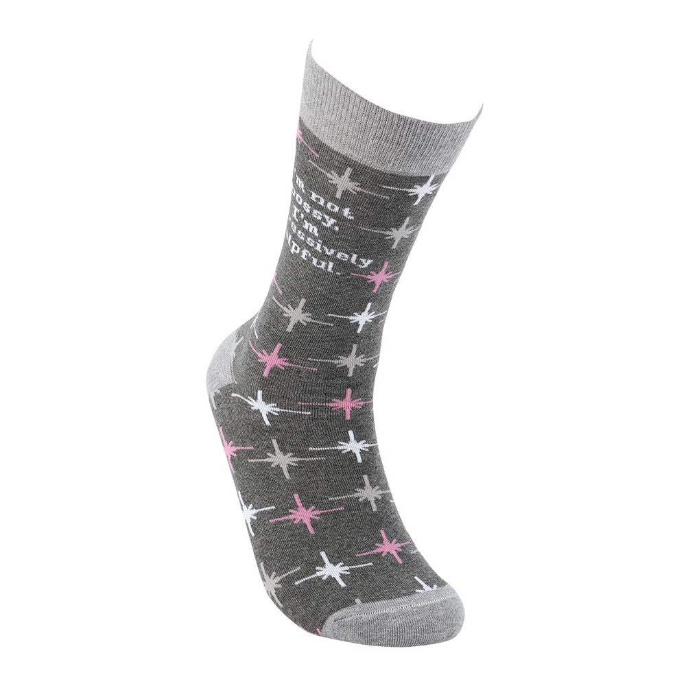 Gray sock with pink and white star pattern and a humorous phrase.