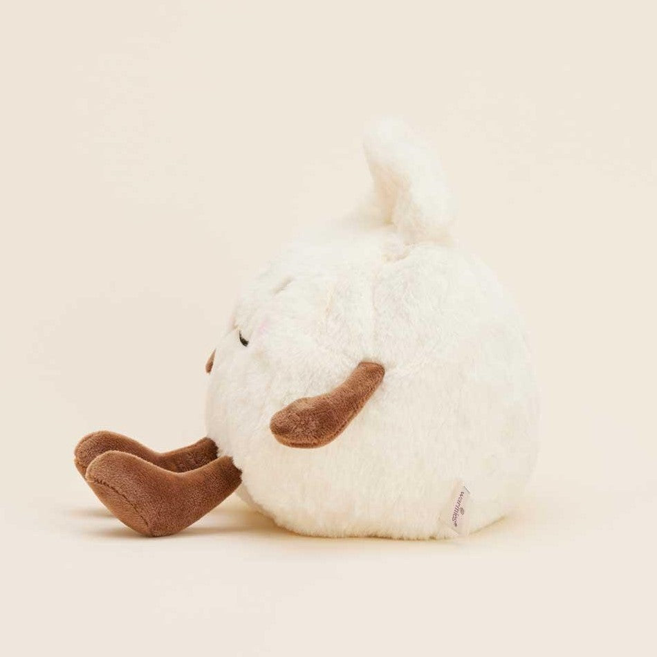 Round, fluffy white plush with brown feet and arms.