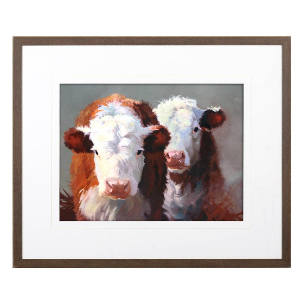 Two cows in a framed painting with a neutral background.