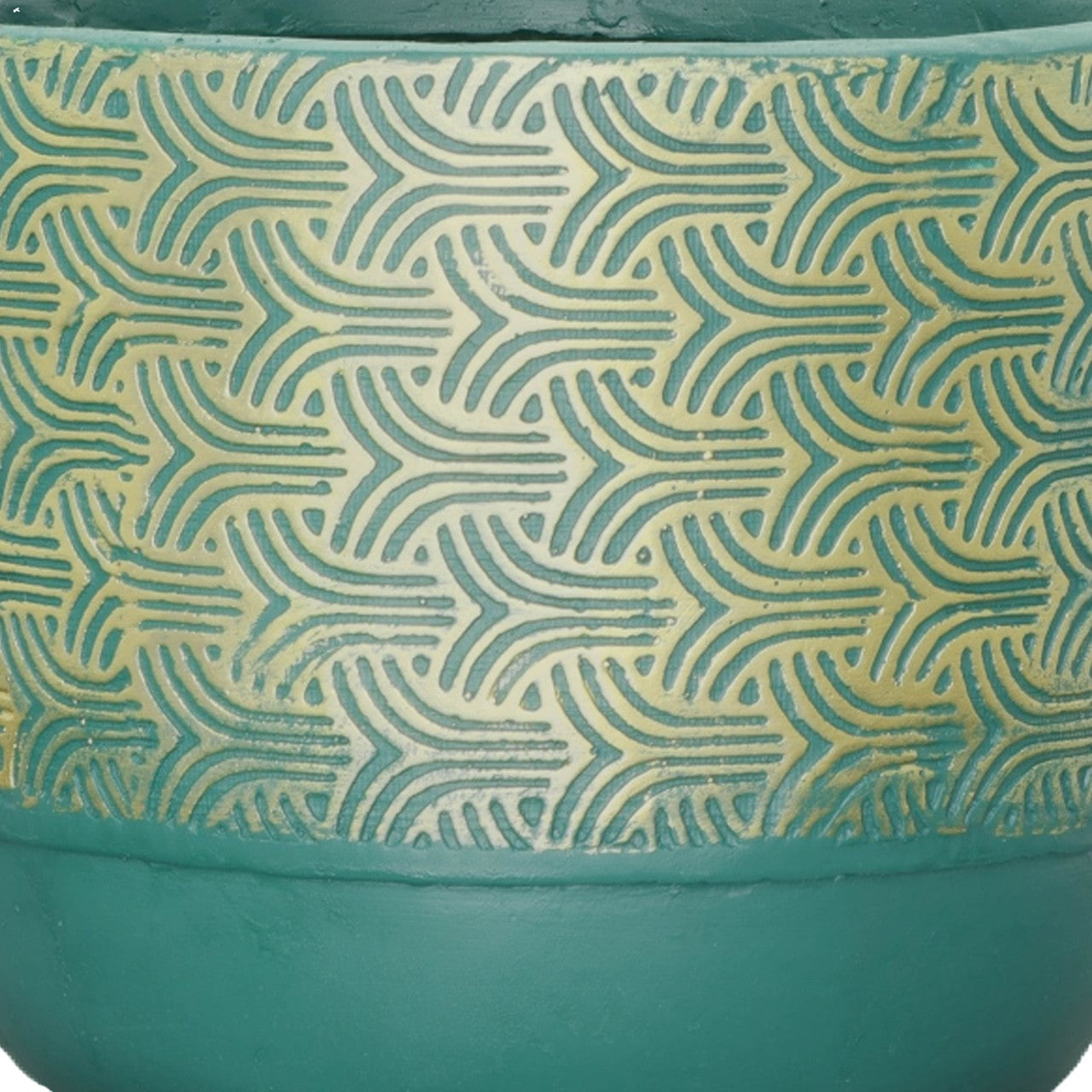 Teal pot with intricate, repeating geometric patterns.