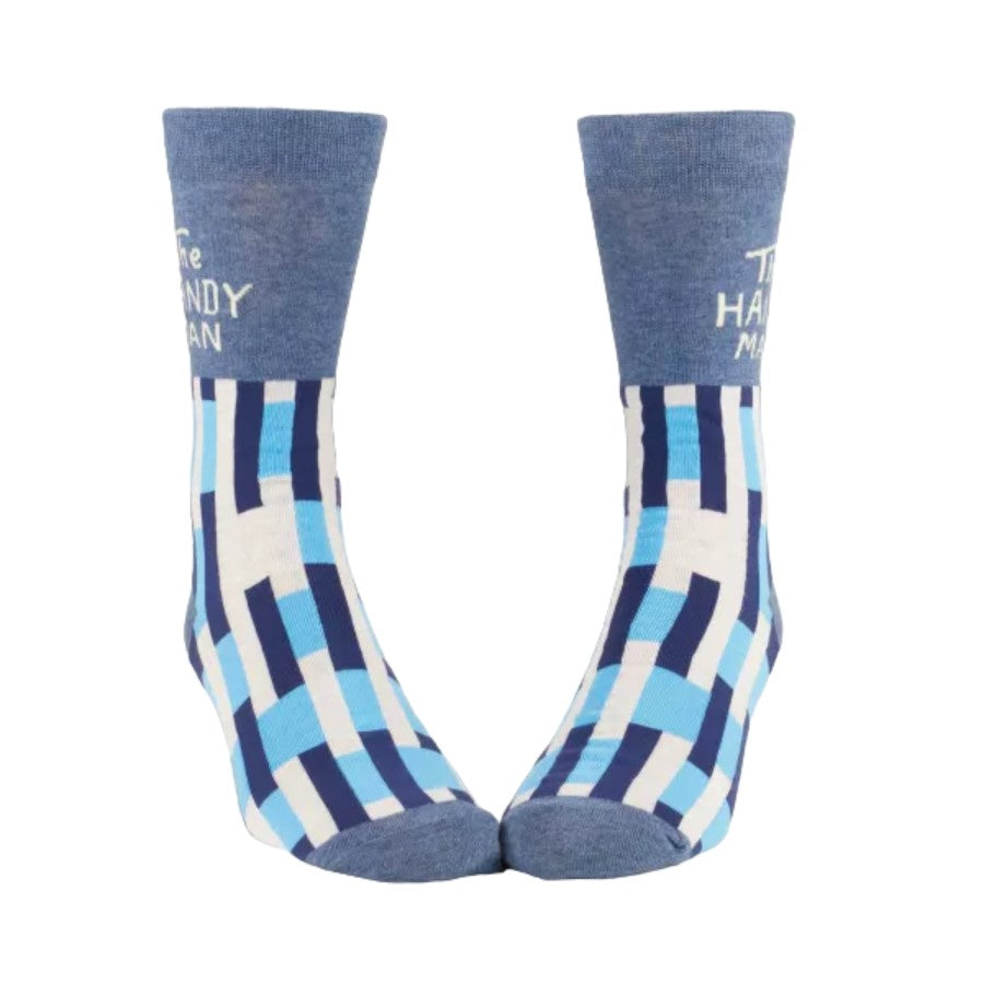 Colorful blue geometric socks with text near the top.