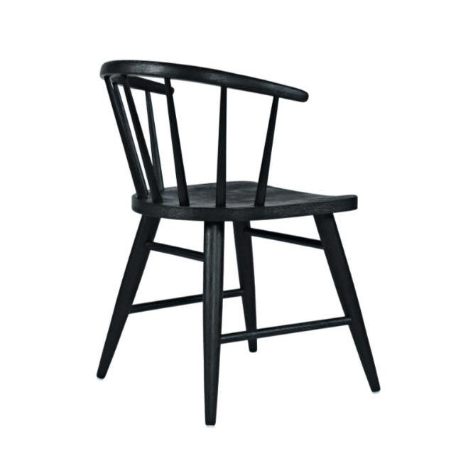 Black wooden chair with a curved back and spindles, side view.
