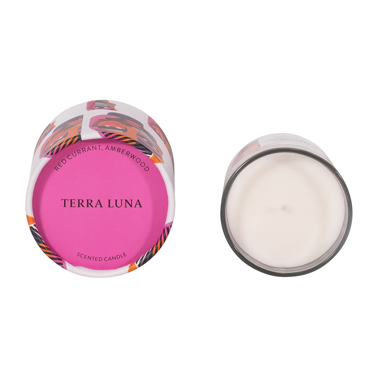 Pink-capped "Terra Luna" scented candle with a white interior.