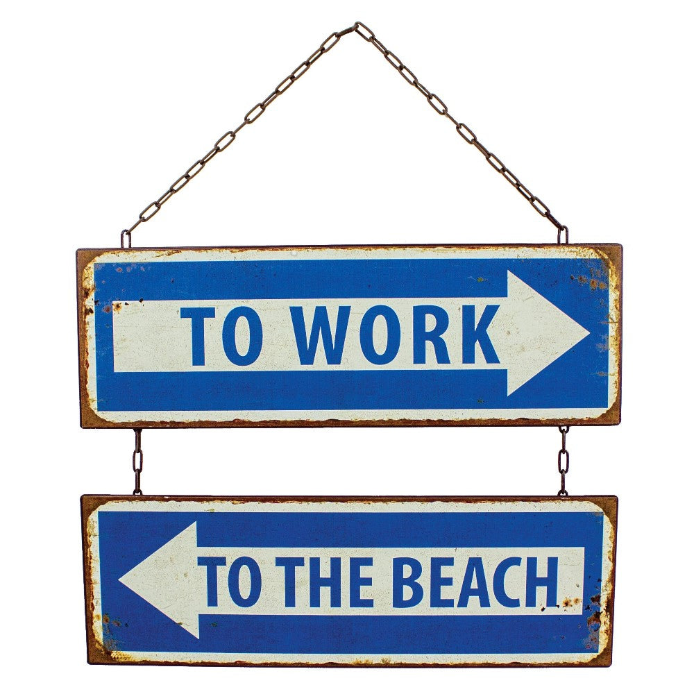 Signs pointing "TO WORK" and "TO THE BEACH" in opposite directions.