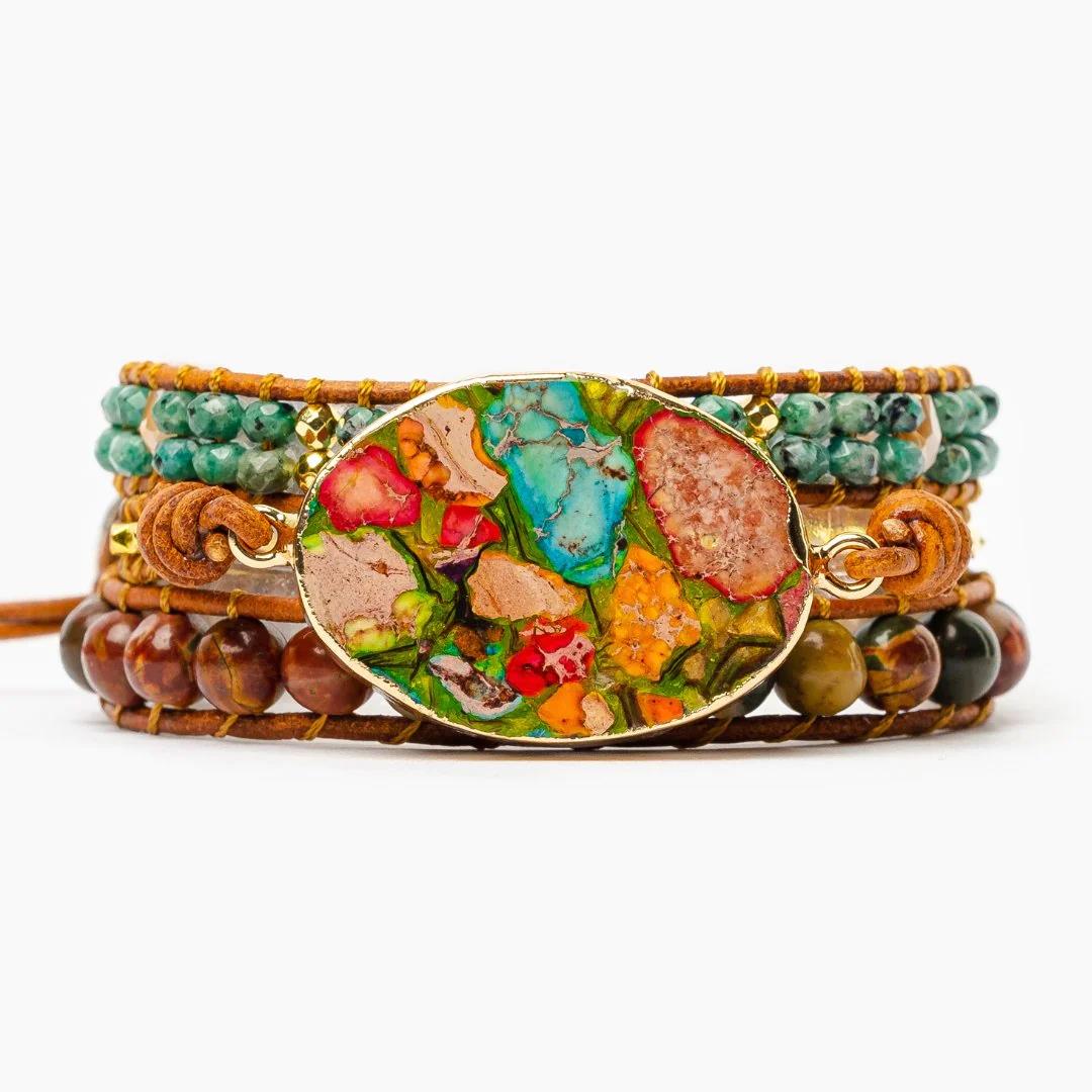 Colorful gemstone bracelet with leather wrap and beaded layers.