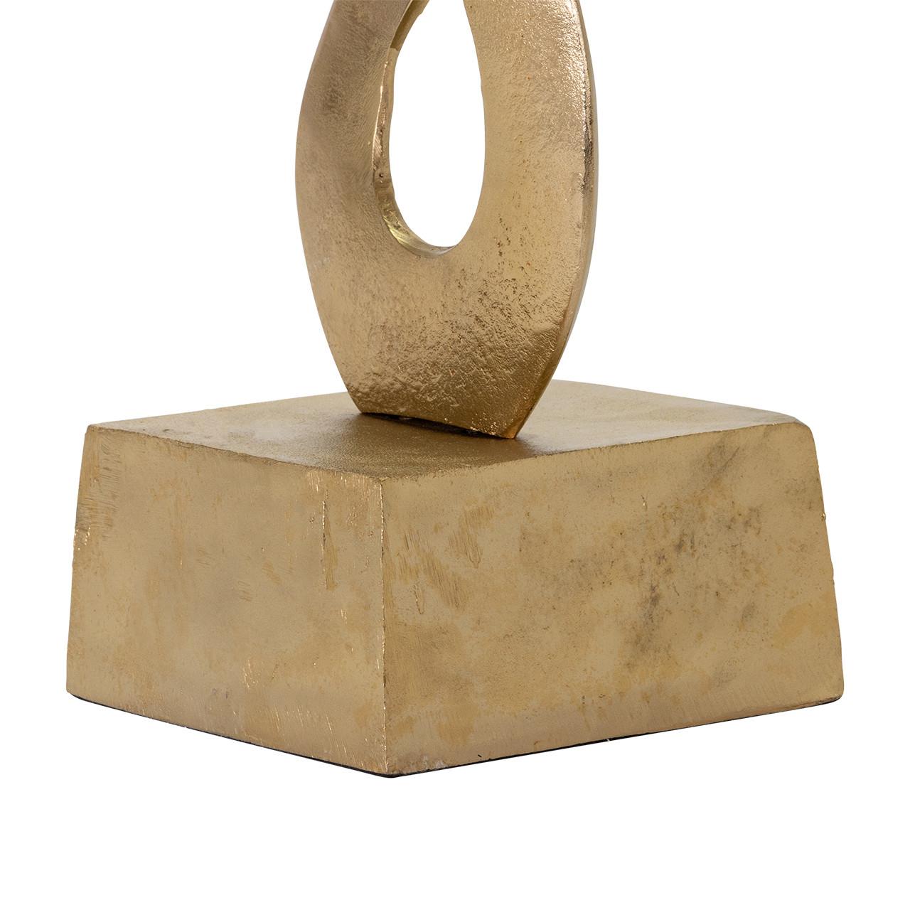 Gold metallic sculpture on a square base.