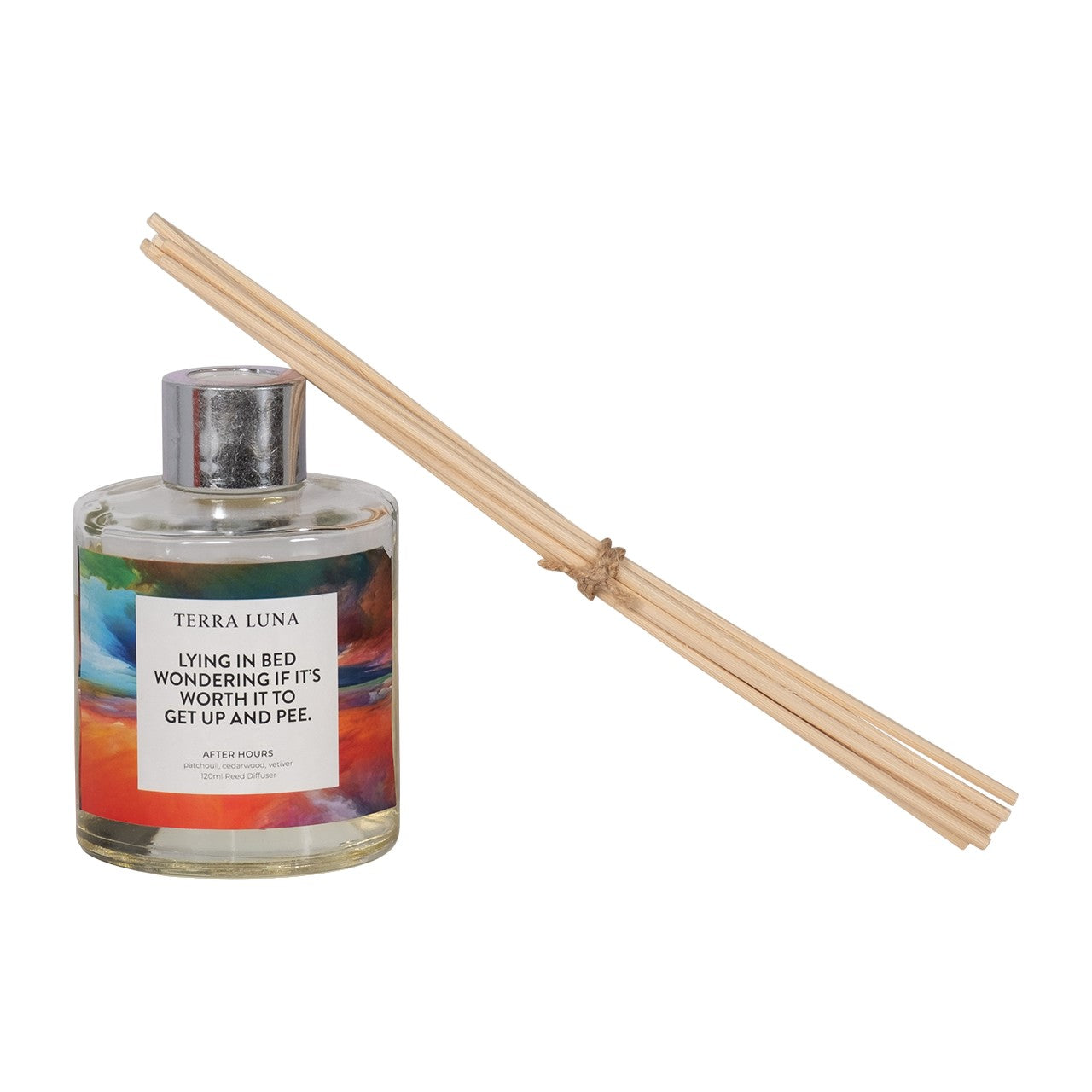 Reed diffuser with humorous label and bundle of sticks.