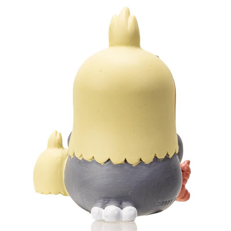 Cute cartoon bird figurine with a yellow head and gray body.