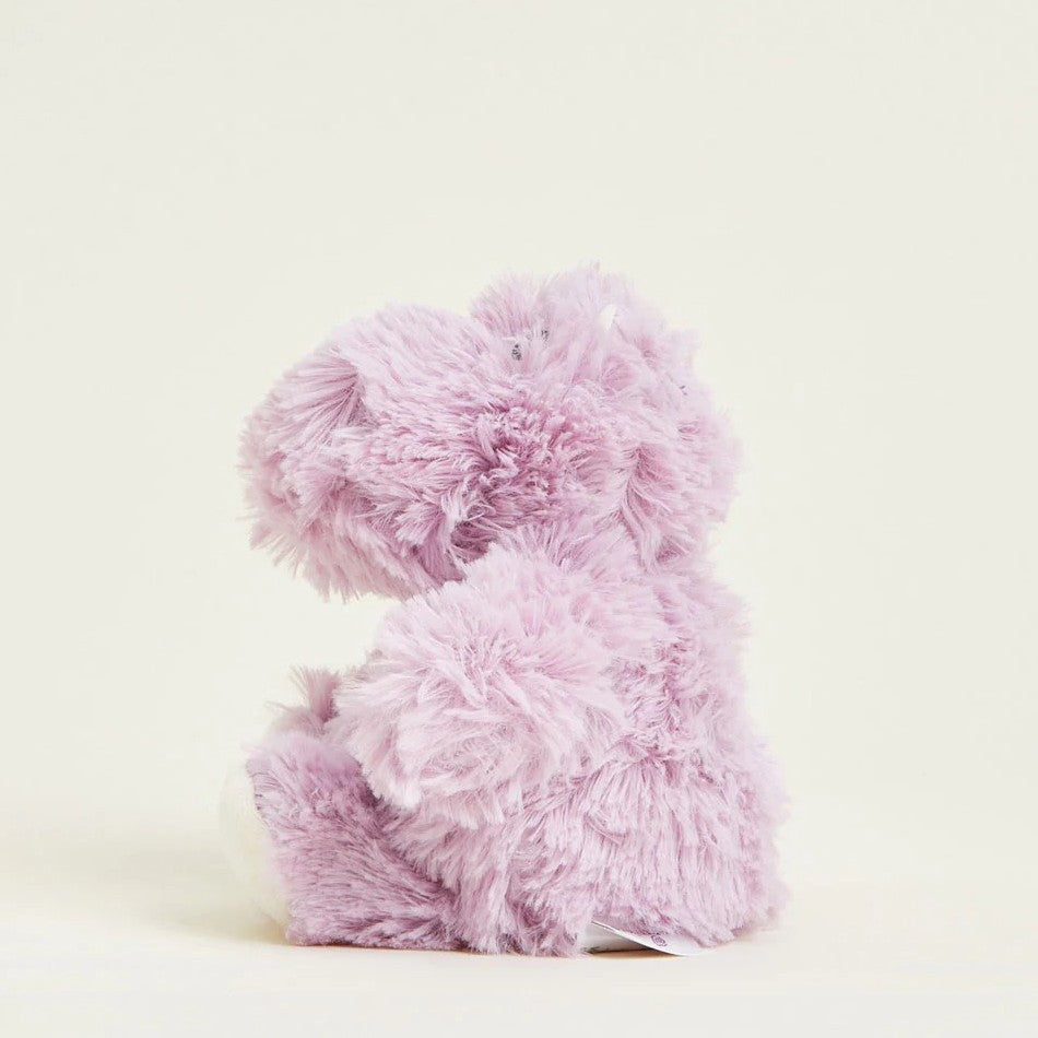 Plush lavender hippo toy on a plain background.