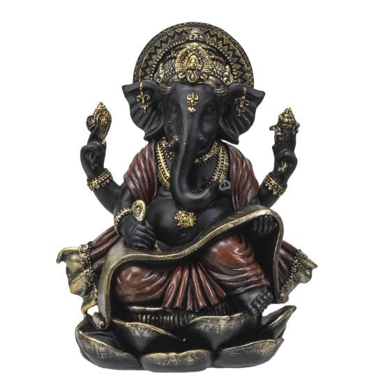 Elephant-headed deity statue with intricate details and ornate attire.
