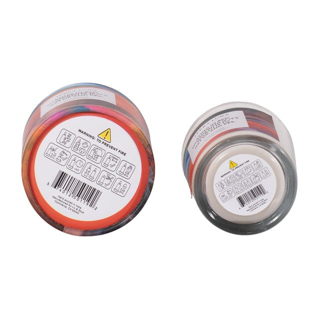 Two labeled candle bases with safety warnings and barcodes.